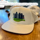 HARD SHELL, SIX PANEL, LASER-CUT HOLES, UNDERPOCKETS HAT